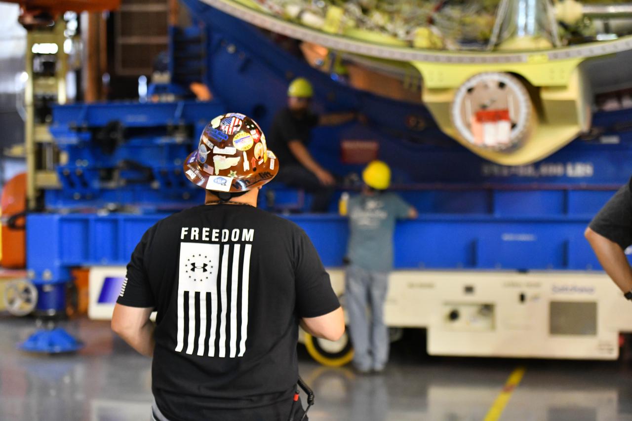Technicians at NASA’s Michoud Assembly Facility in New Orleans rotated the engine section for NASA’s Space Launch System rocket from a vertical to horizontal position to prepare it for joining to the rest of the rocket’s core stage on Sept. 13. The engine section, which comprises the lowest portion of the 212-foot-tall stage, is the last major component to be horizontally integrated to the core stage. Michoud crews completed assembly on the flight hardware that will be used for Artemis I, the first lunar mission of SLS and NASA’s Orion spacecraft, on Aug. 29. The core stage’s two liquid propellant tanks and four RS-25 engines will produce more than 2 million pounds of thrust to send the SLS rocket and Orion on the Artemis lunar missions. The engine section houses the four RS-25 engines and includes vital systems for mounting, controlling and delivering fuel form the propellant tanks to the rocket’s engines.  Offering more payload mass, volume capability and energy to speed missions through space, the SLS rocket, along with NASA’s Gateway in lunar orbit and Orion, is part of NASA’s backbone for deep space exploration and the Artemis lunar program. No other rocket is capable of carrying astronauts in Orion around the Moon in a single mission.